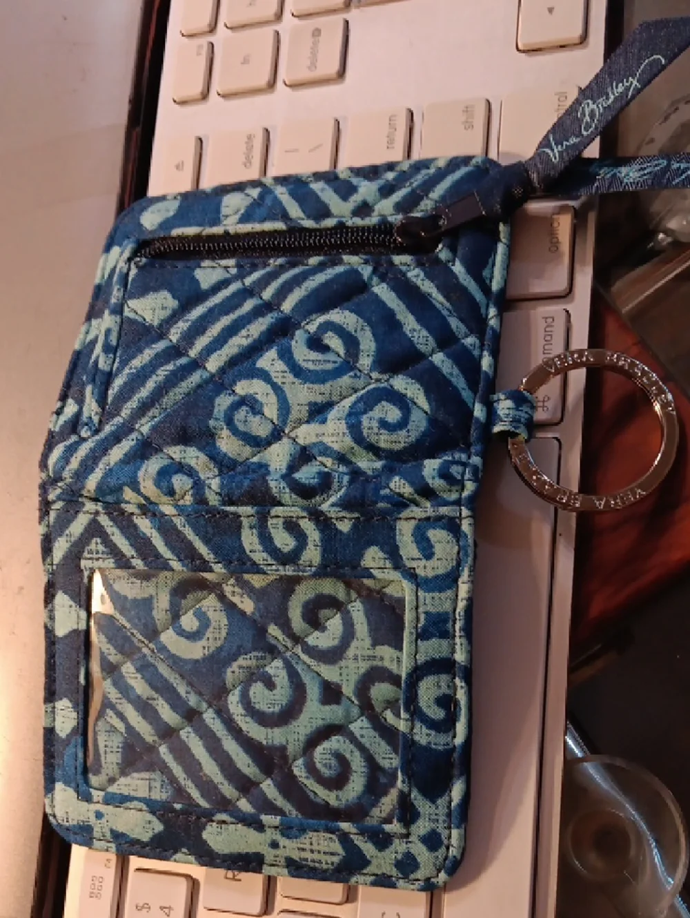 Vera Bradley Zip ID Case in a blue batik-inspired geometric pattern. - Picture 3 of 11